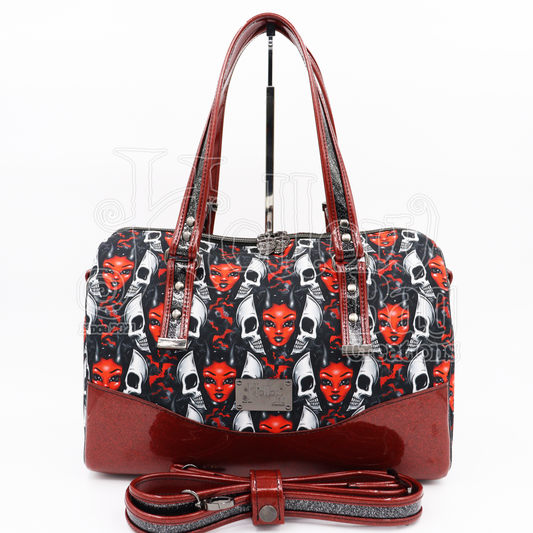 The Reveal Barrel Bag